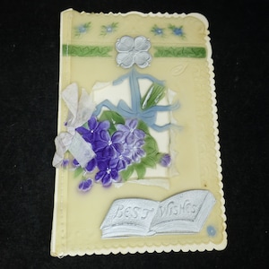 Vintage jaren 1930 ongebruikte "Beste wensen" wenskaart paarse bloem - Handgeschilderde plastic hoes genaaid op omslag - Art Deco-wenskaart