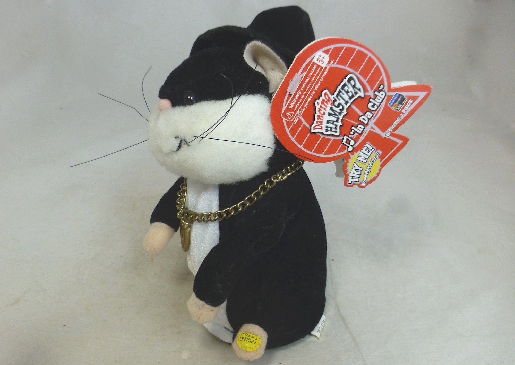 Singing top hamster toy