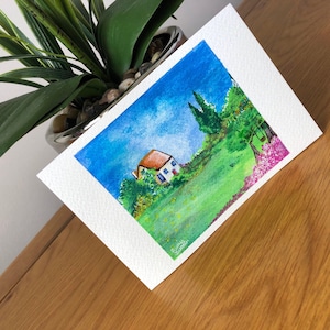 Carte postale peinte à la main d’une maison de campagne