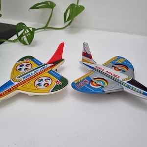 2 x Vintage Tinplate Jet Planes with Kaleidoscopic Wings / Friction Toy / Tin Litho Toys
