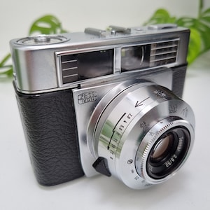 Appareil photo argentique Zeiss Ikon Symbolica 35 mm avec viseur 35 mm avec étui de transport en cuir marron et dragonne