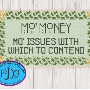 May include: Cross stitch pattern with a green background and a white border. The pattern says "Mo' Money Mo' Issues With Which To Contend".