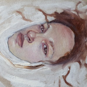 Original painting depicting a young girl's head floating in a white substance. She is making an eye contact with the viewer, looking tired and melancholic. Color palette: muted pinks, purples, yellows, warm brown and white.