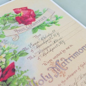 Vintage floral marriage certificate with custom calligraphy for the blank spaces for the wedding details.