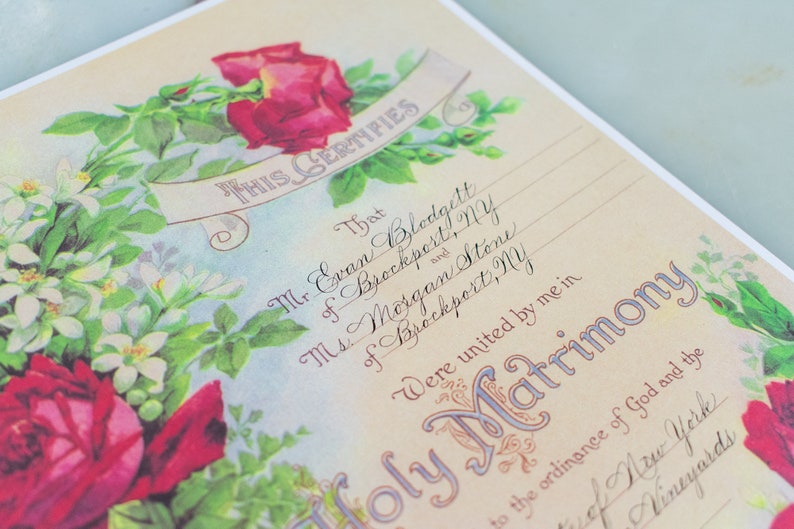 Vintage floral marriage certificate with custom calligraphy for the blank spaces for the wedding details.