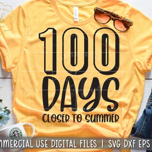 Pode incluir: Uma camiseta amarela com texto preto que diz "100 dias mais perto do ver&atilde;o".