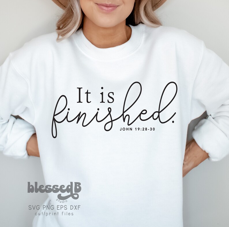 May include: White sweatshirt with the text "It is finished." in black cursive lettering and the Bible verse "JOHN 19:28-30" underneath.