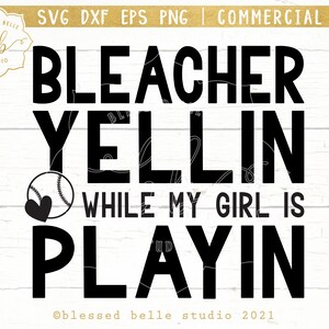May include: Black and white graphic design with the text "Bleacher Yellin While My Girl Is Playin" and a baseball with a heart in the center.
