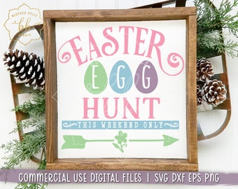 May include: A white wooden sign with the text "Easter Egg Hunt This Weekend Only" in pink, green, and blue lettering. The sign also features a green arrow with a flower and three colorful eggs.
