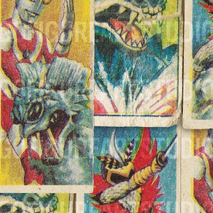 May include: A collection of vintage trading cards featuring colourful illustrations of monsters and superheroes. The cards are worn and faded, with some showing signs of age and use. The cards are arranged in a grid pattern, with each card showing a different character.