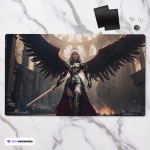 May include: A fantasy-themed playing mat featuring a female angel warrior with large black and red wings, wearing golden armor and a red cape, holding a sword in a dark, gothic cathedral setting.
