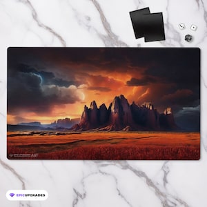 May include: A red, orange, and purple sunset over a desert landscape with a range of rocky mountains in the distance. The sky is filled with clouds and stars. The ground is covered in a field of tall grass.