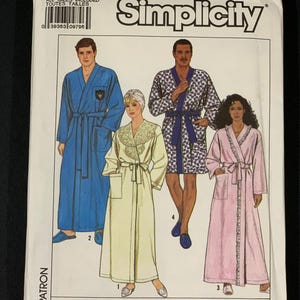 May include: Simplicity sewing pattern 9458 featuring illustrations of four different robes. The pattern includes all sizes and is suitable for overlock/serger machines. The words "Easy to Sew" are printed on the bottom right.