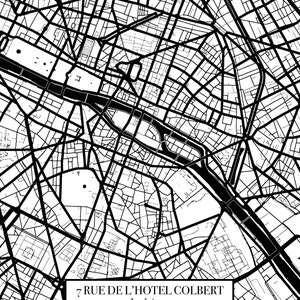 May include: A black and white map of a city with a black rectangle at the bottom. The rectangle contains the text "7 RUE DE L'HOTEL COLBERT" and "Je t'aime" with the date "August 17".