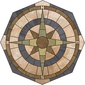 May include: Octagonal compass design made of stone tiles in shades of brown, beige, and blue. The compass points north, south, east, and west.