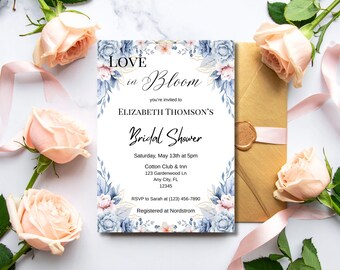 May include: A bridal shower invitation with floral accents. The invitation features the text "Love in Bloom" and details for Elizabeth Thomson's bridal shower. The invitation is surrounded by peach roses and a gold envelope.