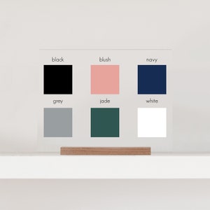 Color choices in black, blush, navy, grey, jade, and white.