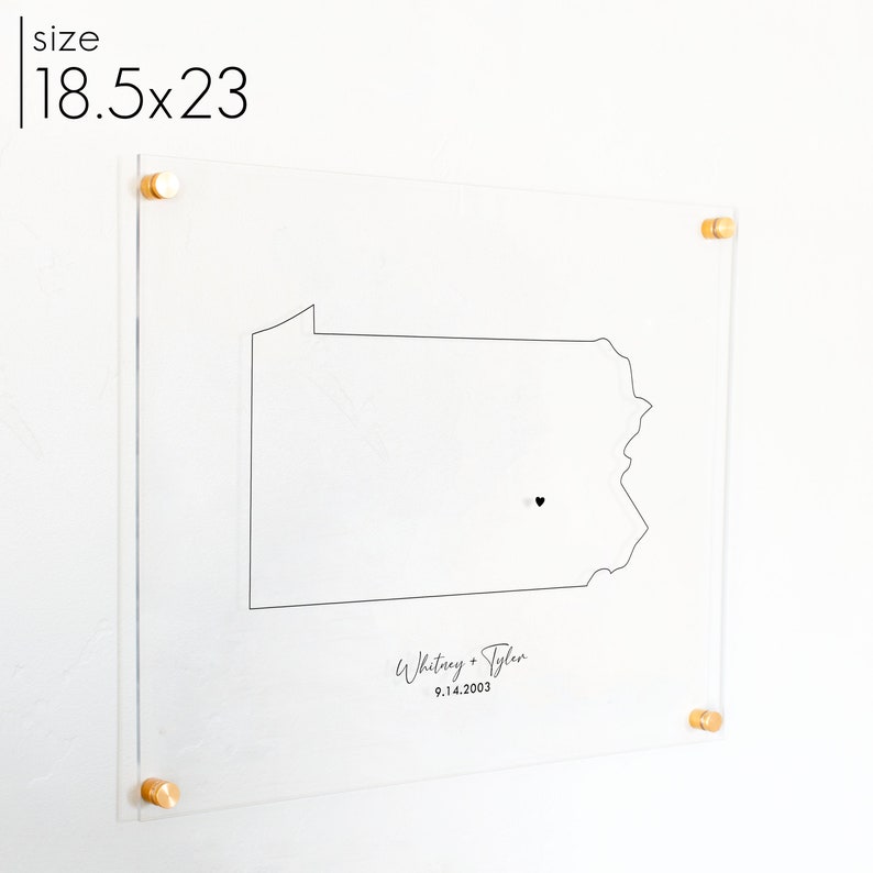 This wall art decor is of the state of Pennsylvania. It is a an acrylic sign that is personalized to show the outline of the state, the name, and where the couple met. All printed in black and hangs on a wall.