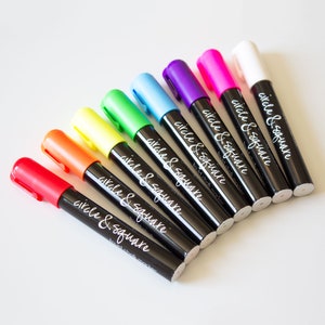 6mm chalk markers with the various colors: Red, orange, yellow, green, blue, purple, pink neon.