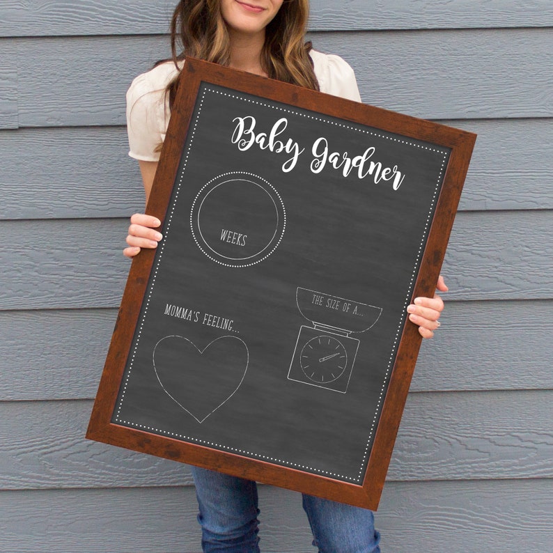 Woman holding a Personalized Pregnancy Tracker acrylic  Board