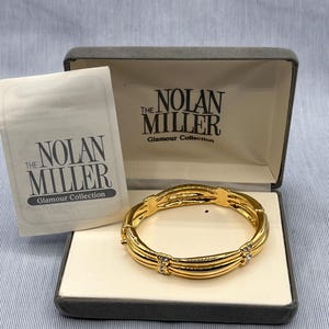 Gold Tone Noland Miller Glamour collection Bracelet. With box and original paperwork.- Free Shipping