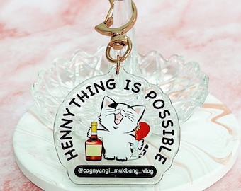 Keychain Hennything Is Possible Fun Text with Chilling Cat Logo Unique Keychain, Bag Charm, Keyring for Hennessy Lovers