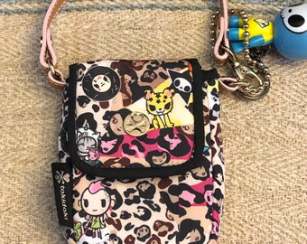 Tokidoki Serena-Leo all over Character infused Leopard Print Phone Wristlet with leather-like strap and Adios Qee Key Fob.