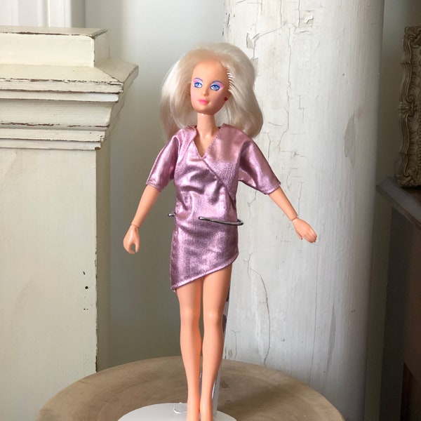 1980s Vintage Jem and the Holograms Jerrica Doll, inPink Lamé dress. As found. Very clean but missing accessories.