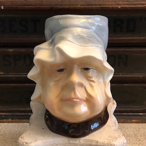 Vintage Kingston Pottery Mrs Bumble (Oliver Twist) Toby Jug in soft colors. Made in England. Max height 6”