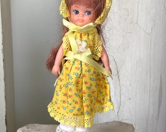 Knickerbocker 1950 Hard Plastic Toddler Side Eyed doll with adorable knit dress