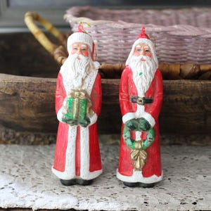 Two Vintage Plastic Santa Claus Ornaments
