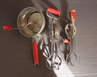 Three Vintage Red Handled Kitchen Utensils Food Mill & Hand Mixers Vintage Red Kitchen