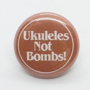Ukuleles Not Bombs! - 1 inch Pin or Keychain or Zipper Pull-Magnets too!