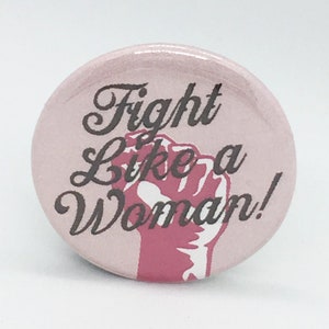Fight Like a Woman! - 1 1/4 inch Pin or Magnet or Keychain or Zipper Pull