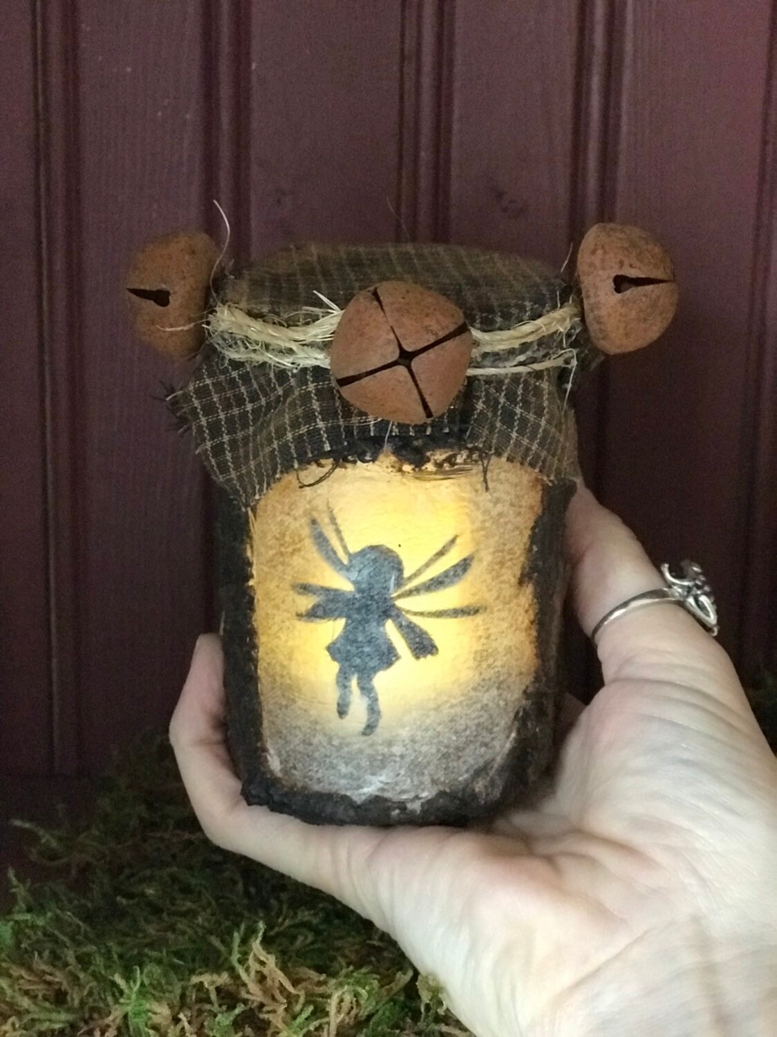 fairy with lantern statue