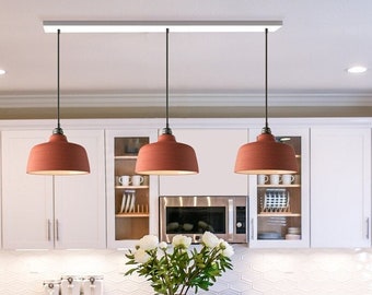 Multiple suspension 3 COPPA CLOCHE CORAL ceramic lamps mounted on a metal canopy 800 mm long