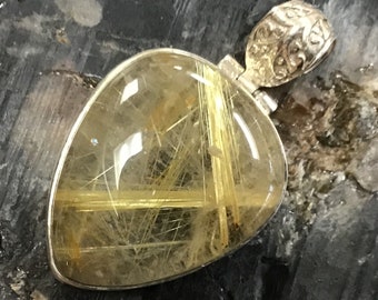 Scintillating Golden Rutilated Quartz Pendant