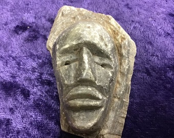 Ancient Artifact - face in soapstone,