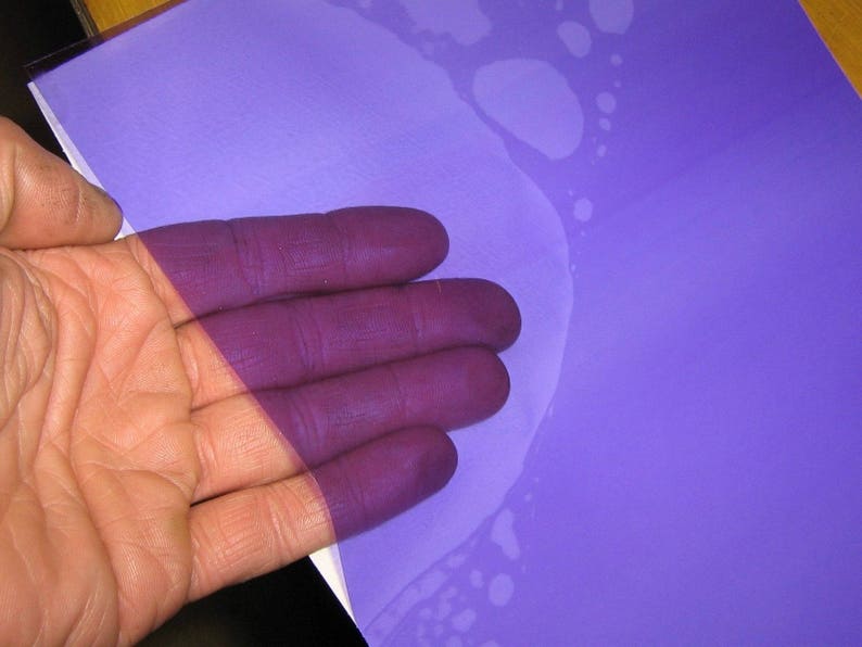 Rolls of Transparent Colored Plastic , Adhesive Coated Violet