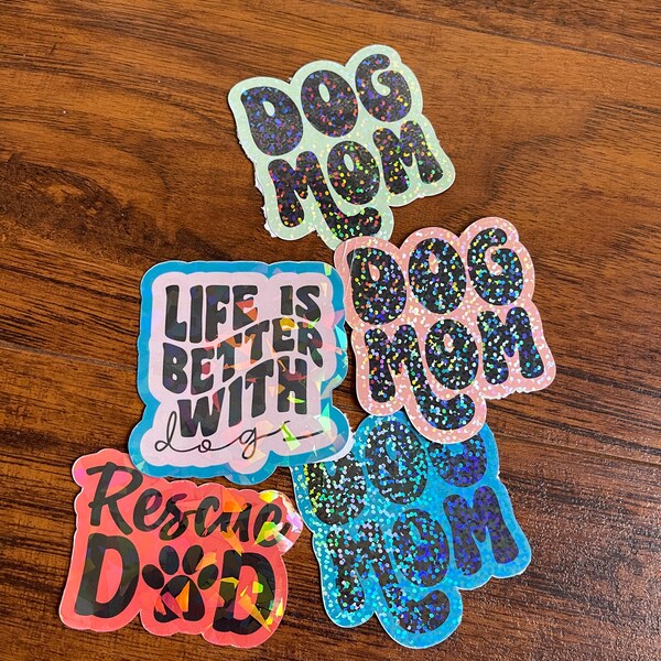 Holographic dog mom, dog dad, rescue dad, life is better with dogs. 1 sticker.