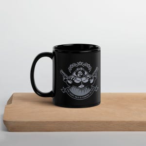 Tazza nera lucida "La fiaba sta arrivando da te"