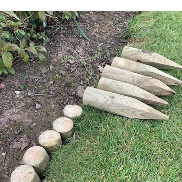 Short round edging stakes 10" long pointed Pressure treated green. 16 stakes covers 1 meter run set by side. Discount on quantity order.