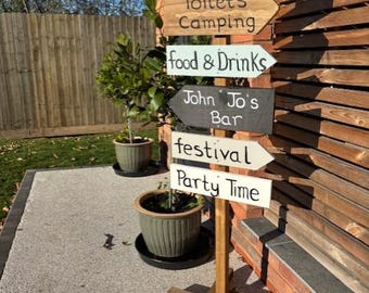 Wooden Personalised direction signs and stand, finger post with six direction boards.