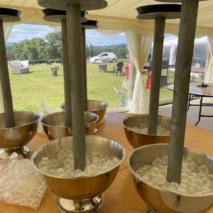 Wedding table centrepiece champagne bucket flower arrangement stand, table arrangement