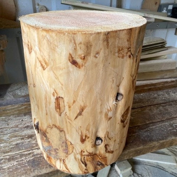 Hammerschlagen log stump for German nail game, hammer striking, Oktoberfest beer game, rustic log stump.