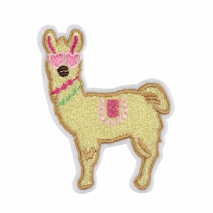 May include: A yellow llama with pink heart-shaped sunglasses and a pink and green floral design on its back. The llama is embroidered on a white background.