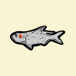 May include: A black and white illustration of a fish with a red eye. The fish is drawn in a simple, cartoon style.