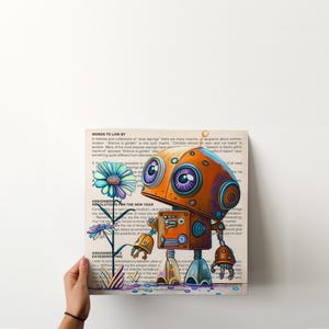 Puede incluir: Una ilustraci&oacute;n colorida de un robot con grandes ojos morados y un cuerpo naranja brillante. El robot est&aacute; de pie en una p&aacute;gina de un libro con texto sobre palabras para vivir y resoluciones para el nuevo a&ntilde;o. El robot est&aacute; mirando una flor azul y verde.