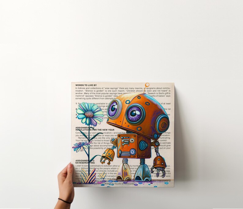 Puede incluir: Una ilustraci&oacute;n colorida de un robot con grandes ojos morados y un cuerpo naranja brillante. El robot est&aacute; de pie en una p&aacute;gina de un libro con texto sobre palabras para vivir y resoluciones para el nuevo a&ntilde;o. El robot est&aacute; mirando una flor azul y verde.