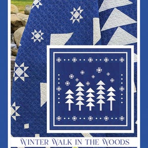 May include: A blue and white quilt with a winter theme. The quilt features geometric shapes, including stars and triangles, and a central square with stylized trees. The text "Winter Walk in the Woods" is displayed at the bottom.